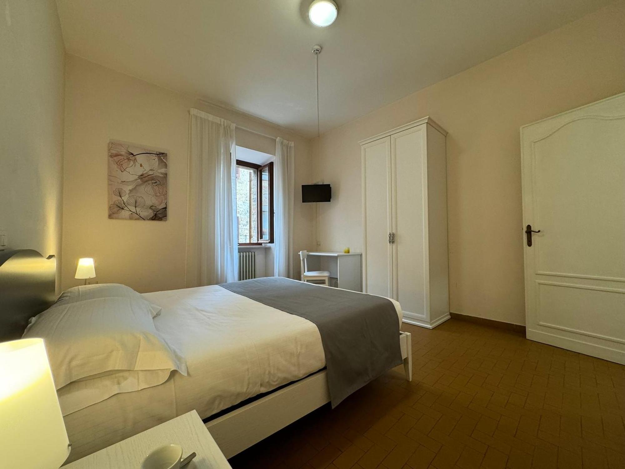 Monastero Ss. Annunziata Hotel Todi Bagian luar foto A room at the hotel